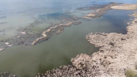 Aerial Drone Flight Over a Unique Rocky Coastline of a Lake. Stock Footage 312237774