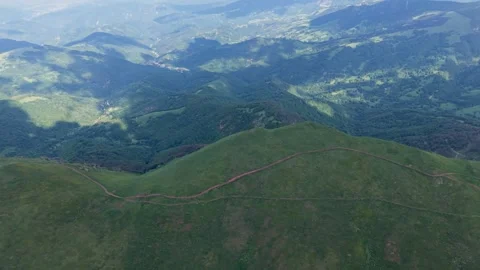 Aerial Drone Flight Over Winding Ridge Trail on Stara Planina Mountain Stock Footage 338354780