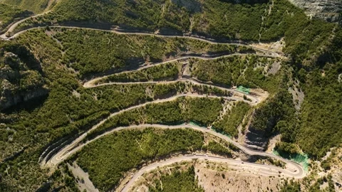 Aerial Drone Flight Over Winding Mountain Road SH20 in Albania Vidéo 342270235