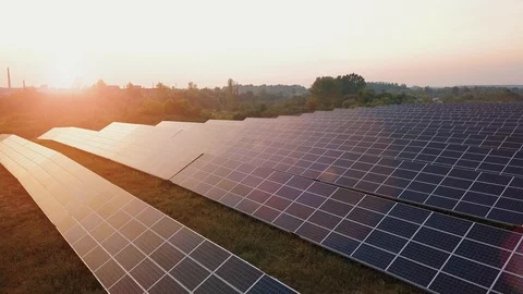Aerial drone Flight At Sunset Over Solar Panels Farm Green Energy Ver 8 Video stock 114775159