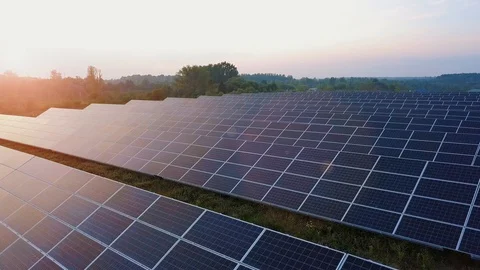 Aerial drone Flight At Sunset Over Solar Panels Farm Green Energy Ver 9 Stock Footage 114775401