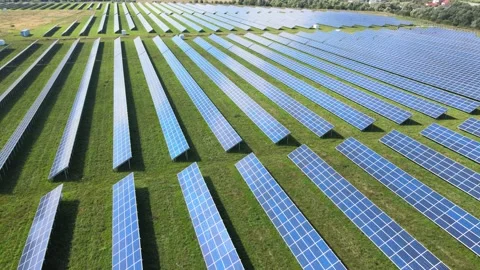 Aerial drone Flight At Sunset Over Solar Panels Farm Green Energy Stock Footage 159877128