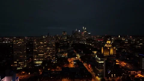 Aerial Drone Flight Through Center City Philadelphia at Night Stock Footage 165433409