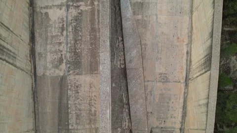 Aerial drone flight through Conde de Guadalhorce-Gaitanejo reservoir water slide Stock Footage 295314117