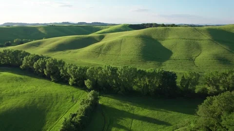 Aerial drone flight through green Tuscany Hills Stock Footage 310550112