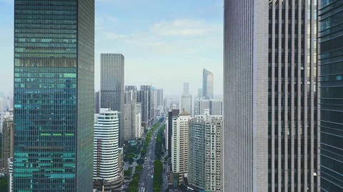 Aerial drone flight through modern city skyscrapers and parks Stock Footage 333814951