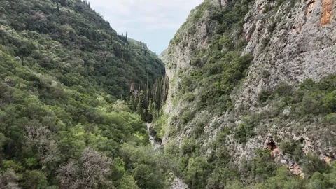 Aerial Drone Flight Through Vyros Gorge Near Kardamyli, Greece Video stock 302706357