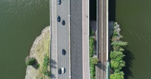 Aerial Drone Flight top down View of freeway busy city rush hour Stock Footage 147842141