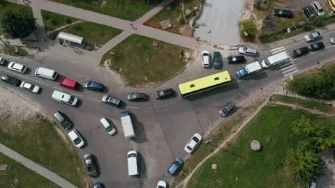 Aerial Drone Flight top down View of stuck cars and buses on crossroad at rush Stock Footage 152380929