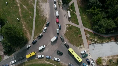 Aerial Drone Flight top down View of stuck cars and buses on crossroad at rush Stock Footage 152381003