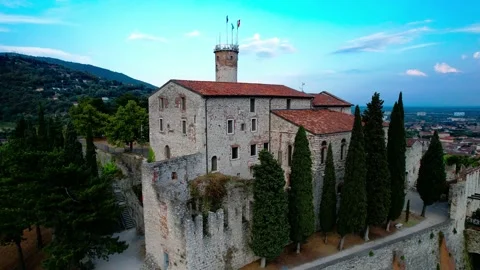 Aerial drone flight view reverse Brescia medieval castle above town 4K Stock Footage 202592420