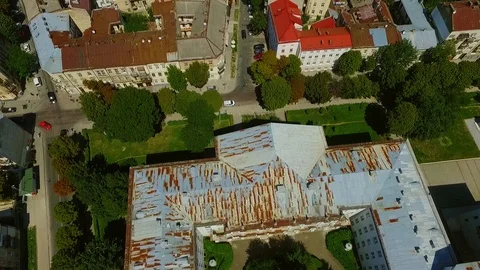 Aerial drone flight view on roofscape of old-fashioned apartment buildings. Old 스톡 동영상 105270215