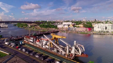 Aerial Drone Fly Forward and Pan Left over Industrial Barge on Ozama River Stock Footage 344917840