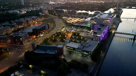Aerial drone fly forward over STV and BBC Scotland buildings beside the River Cl Vídeos de archivo 328467437