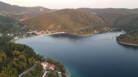 Aerial drone fly-forward shot of Panormos bay Skopelos Stock Footage 336597914