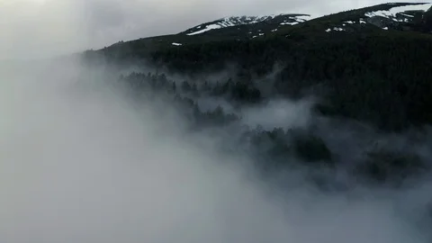 Aerial drone fly over misty clouds in mountains Video stock 123406953