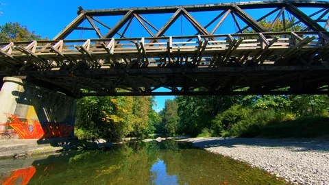 Aerial Drone Fly Under Bridge Above Water, Beautiful Water Forest Landscape View Stock Footage 106203074
