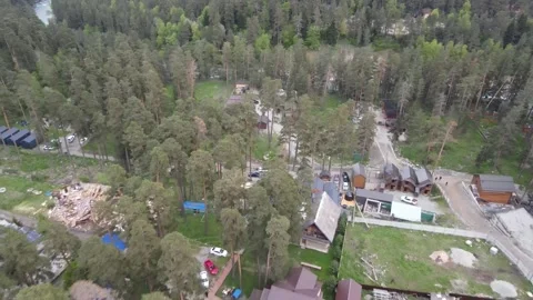 Aerial drone flyback over mountain village settlement Stock Footage 337456762
