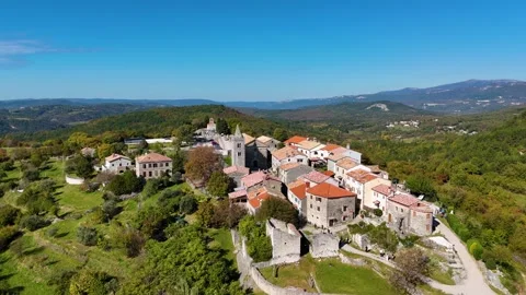 Aerial drone flying around hum smallest town in the world 스톡 동영상 335847223