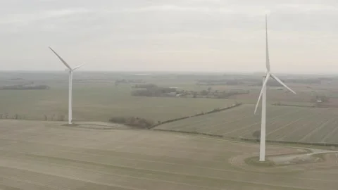 Aerial Drone flying between 2 wind turbines. 4K D-Log 動画素材 149978252