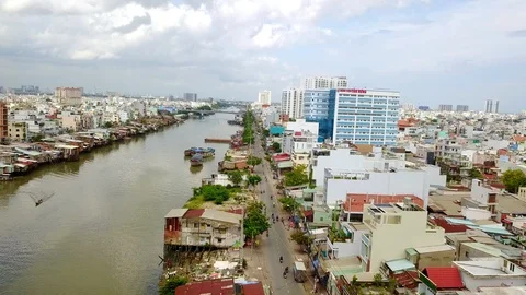 Aerial Drone - Flying Down Kenh Te River in Ho Chi Minh City Vietnam Stock Footage 87222986