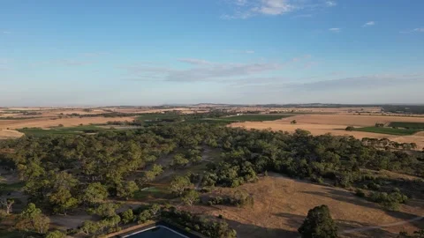 Aerial Drone Flying Forward Over Dry Drought Yellow Farmland in Rural Area Vídeo Stock 328143155