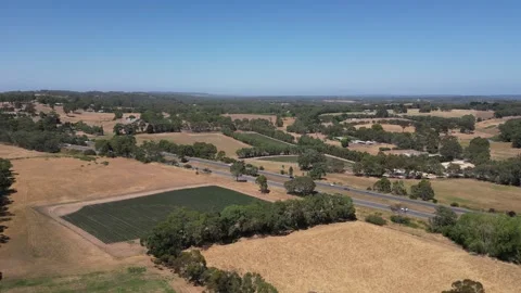 Aerial Drone Flying Forward Over Dry Drought Yellow Farmland in Rural Area 库存影片 333365356