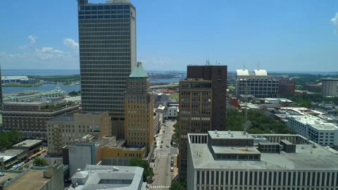 Aerial drone flying low through downtown towers Mobile Alabama USA Stock Footage 93570038
