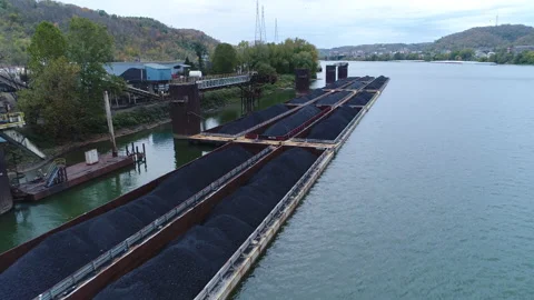 Aerial Drone Flying Over Coal Barges in Rural Ohio River Stock Footage 228979136