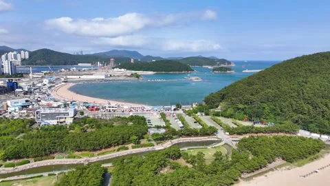Aerial drone flying over dadaepo beach and bay in busan south korea Stock Footage 337914640