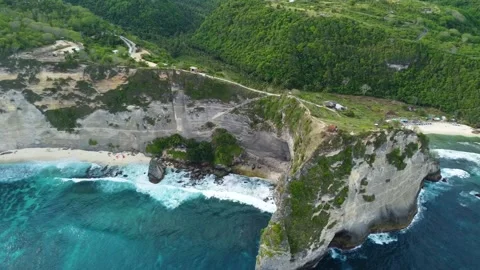 Aerial drone flying over diamond beach in nusa penida, bali Stock Footage 336594075