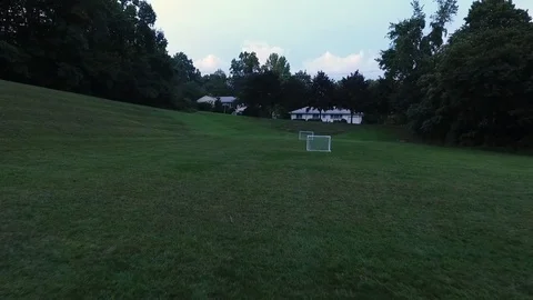 Aerial Drone Flying Over Empty Soccer Field At Dusk Stock-Footage 112273932