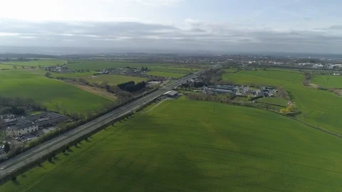 Aerial Drone flying over fields towards Leeds city centre Stock-Footage 105807107
