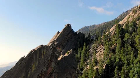 Aerial drone flying over flat irons mountains at chautauqua park in Boulder Colo Stock-Footage 102685503