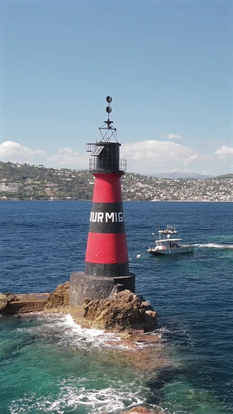 Aerial drone flying over Fourmigue rock near Antibes France. vertical Stock Footage 344759669
