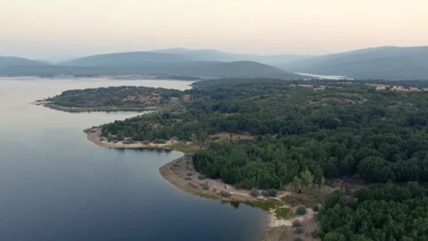 Aerial drone flying over La Cuerda del Pozo Reservoir in Soria 動画素材 342606871