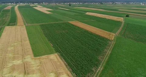 Aerial drone flying over large farming fields Stock Footage 145307000
