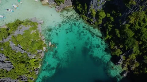 Aerial drone flying over twin lagoon in coron, philippines Stock Footage 342576155