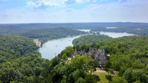Aerial Drone Flyover of Lake of the Ozarks, Castle Ruins 4K Stock Footage