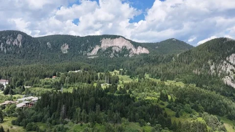 Aerial Drone Flyover Showing Construction Site and Cell Tower in Mountain Forest Stock Footage 342397074