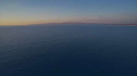 Aerial drone footage of beautiful ocean during sunset Stock Footage 59042688