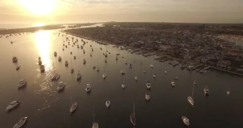 Aerial Drone footage of boats in Balboa harbor in Newport Beach, California Stock Footage