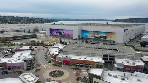 Aerial / drone footage of the Boeing assembly plant, wall murals, factory Stock Footage 129209005