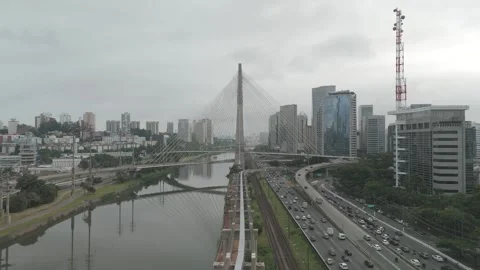 Aerial drone footage of cable-stayed bridge over Pinheiros River in Brazil Stock Footage 320850424