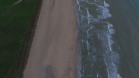 Aerial drone footage of coastline at Omaha Beach in Normandy, France. Stock Footage