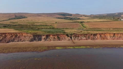 Aerial drone footage of Compton Bay and Brook Chine Beach Stock Footage 340528868