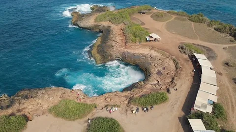 Aerial drone footage of devil´s tears in Nusa Lembognan Bali Inonesia rough coas Stock Footage 95137006