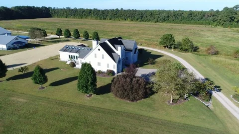 Aerial Drone footage fly by of horse farm in suffolk virginia Stock Footage