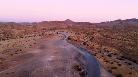 Aerial Drone Footage Going Over California Desert and Mountains at Sunset Stock Footage 229486653