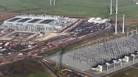 Aerial drone footage of a Google data center under construction in Westpoort 動画素材 328296540